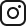 La imagen es un ícono en blanco y negro que representa el logotipo de Instagram. Es un diseño minimalista que muestra una cámara dentro de un cuadrado con bordes redondeados, un símbolo comúnmente utilizado para identificar a la popular red social